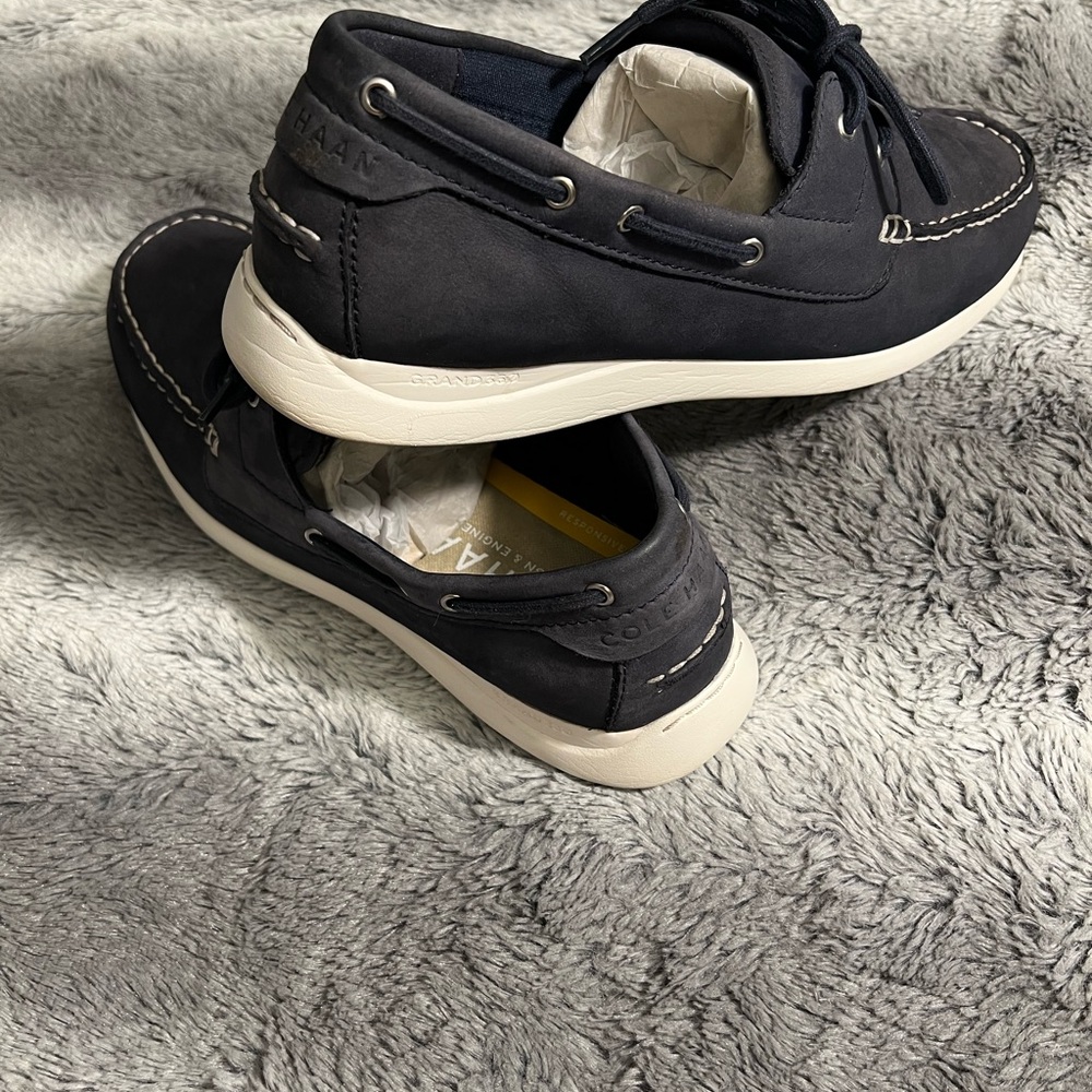 Cole Haan Black and White Boat Shoes with Moccasin Stitching